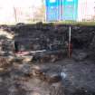 Excavation photograph, NE corner with concrete and tenement foundations, Paisley Abbey, Renfrewshire