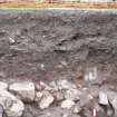 Excavation photograph, Detail - section E and stone structure taken from W, Paisley Abbey, Renfrewshire