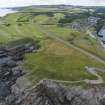 Oblique aerial view from north showing Recreation (Golf Course), Historic Burgh and Harbour and Mid- to Late C20 (The Avenue) Areas of Townscape Character, Eyemouth