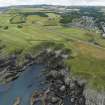 Oblique aerial view from north showing Recreation (Golf Course), Mid- to Late C20 (The Avenue) and Historic Burgh and Harbour Areas of Townscape Character, Eyemouth