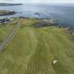 Oblique aerial view from south-east showing Recreation (Golf Course) and Mid- to Late C20 (The Avenue) Areas of Townscape Character, Eyemouth