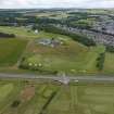 Oblique aerial view from east showing Recreation (Golf Course), Mid- to Late C20 (The Avenue) and Historic Burgh and Harbour Areas of Townscape Character, Eyemouth