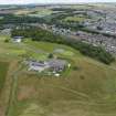 Oblique aerial view from north-east showing Recreation (Golf Course), Mid- to Late C20 (The Avenue) and Historic Burgh and Harbour Areas of Townscape Character, Eyemouth