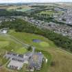 Oblique aerial view from north-east showing Recreation (Golf Course), Mid- to Late C20 (The Avenue) and Historic Burgh and Harbour Areas of Townscape Character, Eyemouth