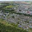 Oblique aerial view from east showing Mid- to Late C20 (The Avenue), Historic Burgh and Harbour, Victorian Expansion and Inter-War (Hurkur Crescent and Schools) Areas of Townscape Character, Eyemouth