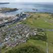 Oblique aerial view from south showing Recreation (Golf Course), Mid- to Late C20 (The Avenue) and Historic Burgh and Harbour Areas of Townscape Character, Eyemouth