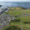 Oblique aerial view from south showing Recreation (Golf Course), Mid- to Late C20 (The Avenue) and Historic Burgh and Harbour Areas of Townscape Character, Eyemouth