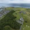 Oblique aerial view from south-west showing Recreation (Golf Course), Mid- to Late C20 (The Avenue) and Historic Burgh and Harbour Areas of Townscape Character, Eyemouth