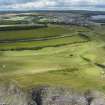 Oblique aerial view from south-east showing Recreation (Golf Course) and area for proposed development in Modern (Gunsgreenhill) Areas of Townscape Character, Eyemouth