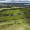 Oblique aerial view from east showing Recreation (Golf Course) and area for proposed development in Modern (Gunsgreenhill) Areas of Townscape Character, Eyemouth