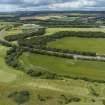 Oblique aerial view from north-east showing Recreation (Golf Course) and area for proposed development in Modern (Gunsgreenhill) Areas of Townscape Character, Eyemouth