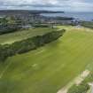 Oblique aerial view from south-east showing Recreation (Golf Course) and area for proposed development in Modern (Gunsgreenhill) Areas of Townscape Character, Eyemouth