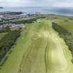 Oblique aerial view from south showing Recreation (Golf Course) and Modern (Gunsgreenhill) Areas of Townscape Character, Eyemouth