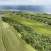 Oblique aerial view from south-west showing Recreation (Golf Course) and area for proposed development in Modern (Gunsgreenhill) Areas of Townscape Character, Eyemouth