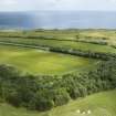 Oblique aerial view from south-west showing Recreation (Golf Course) and area for proposed development in Modern (Gunsgreenhill) Areas of Townscape Character, Eyemouth