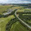 Oblique aerial view from north-north-east showing Recreation (Golf Course) and Industrial (Gunsgreenhill Industrial Estate) Areas of Townscape Character, Eyemouth