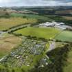 Oblique aerial view from north-east showing Recreation (Golf Course) and Modern (Gunsgreenhill) Areas of Townscape Character, Eyemouth