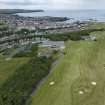 Oblique aerial view from south-south-east showing Recreation (Golf Course), Modern (Gunsgreenhill), Mid- to Late C20 (The Avenue) and Historic Burgh and Harbour Areas of Townscape Character, Eyemouth