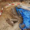 Excavation photograph, Cap stones collapsed on cist taken from W, Keas Cottage, Spinningdale, Highlands