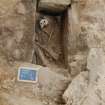 Excavation photograph, Detail of skeleton and cist taken from N, Keas Cottage, Spinningdale, Highlands