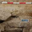 Excavation photograph, Detail of (007) on cap stones taken from S, Keas Cottage, Spinningdale, Highlands