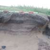 Excavation photograph, North-west facing section of exposed dune before cleaning taken from NW, Farr by Bettyhill, Sutherland, Highland