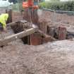 Watching Brief photograph, Working shot of piles and frames taken from SW, Kirtlebridge Marquess SPS Pipeline, Dumfries and Galloway