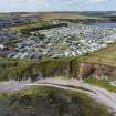 Oblique aerial view from east showing Recreation (Holiday Park), Mid- to Late C20 (Barefoots) and Mid- to Late C20 (Deanhead) Areas of Townscape Character, Eyemouth