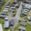 Oblique aerial view from north showing Recreation (Holiday Park) and Mid- to Late C20 (Barefoots) Areas of Townscape Character, Eyemouth