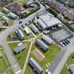 Oblique aerial view from north showing Recreation (Holiday Park) and Mid- to Late C20 (Barefoots) Areas of Townscape Character, Eyemouth