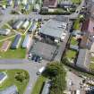 Oblique aerial view from north-west showing Recreation (Holiday Park) and Mid- to Late C20 (Barefoots) Areas of Townscape Character, Eyemouth