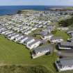 Oblique aerial view from north-north-west showing Recreation (Holiday Park) Area of Townscape Character, Eyemouth