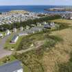 Oblique aerial view from west-south-west showing Recreation (Holiday Park) and Mid- to Late C20 (Barefoots) Areas of Townscape Character, Eyemouth