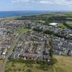 Oblique aerial view from west-north-west showing Modern (Acredale), Mid- to Late C20 (Deanhead) and Industrial (Acredale and Eyemouth Industrial Estates) Areas of Townscape Character, Eyemouth