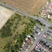 Aerial view from south showing Modern (Acredale) and Mid- to Late C20 (Deanhead) Areas of Townscape Character, Eyemouth