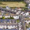 Oblique aerial view from south-west showing Mid- to Late C20 (Deanhead) and Mid- to Late C20 (Barefoots) Areas of Townscape Character, Eyemouth