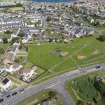 Oblique aerial view from south-west showing Mid- to Late C20 (Deanhead) and Inter-War (Hurkur Crescent and Schools) Areas of Townscape Character, Eyemouth