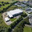 Oblique aerial view from south-east showing Industrial (Acredale and Eyemouth Industrial Estates) and Modern (Acredale) Areas of Townscape Character, Eyemouth