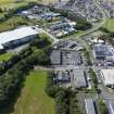 Oblique aerial view from south-east showing Industrial (Acredale and Eyemouth Industrial Estates), Modern (Acredale) and Mid- to Late C20 (Deanhead) Areas of Townscape Character, Eyemouth