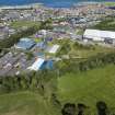 Oblique aerial view from south-west showing Industrial (Acredale and Eyemouth Industrial Estates), Modern (Acredale), Mid- to Late C20 (Deanhead) and Inter-War (Hurkur Crescent and Schools) Areas of Townscape Character, Eyemouth