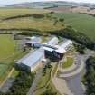 Oblique aerial view from north showing Modern (Gunsgreenhill) and Industrial (Gunsgreenhill Industrial Estate) Areas of Townscape Character, Eyemouth