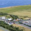 Oblique aerial view from north-west showing Industrial (Gunsgreenhill Industrial Estate) Area of Townscape Character, Eyemouth