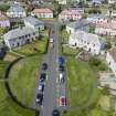 Oblique aerial view from south-east showing Inter-War (Hurkur Crescent and Schools) Area of Townscape Character, Eyemouth