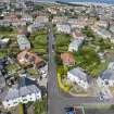 Oblique aerial view from south showing Inter-War (Hurkur Crescent and Schools) Area of Townscape Character, Eyemouth