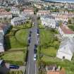 Oblique aerial view from south showing Inter-War (Hurkur Crescent and Schools) Area of Townscape Character, Eyemouth