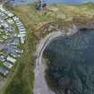 Oblique aerial view from south showing Eyemouth Fort, Eyemouth Battery and Recreation (Holiday Park) Area of Townscape Character, Eyemouth