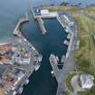 Oblique aerial view from south-south-west showing Historic Burgh and Harbour Area of Townscape Character, Eyemouth