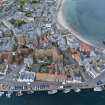 Oblique aerial view from south-east showing Historic Burgh and Harbour and Victorian Expansion Areas of Townscape Character, Eyemouth