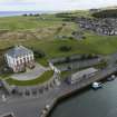 Oblique aerial view from west-north-west showing Historic Burgh and Harbour, Mid- to Late C20 (The Avenue) and Recreation (Golf COurse) Areas of Townscape Character, Eyemouth