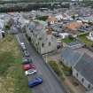 Oblique aerial view from north-north-west showing Victorian Expansion and Inter-War (Hurkur Crescent and Schools) Areas of Townscape Character, Eyemouth